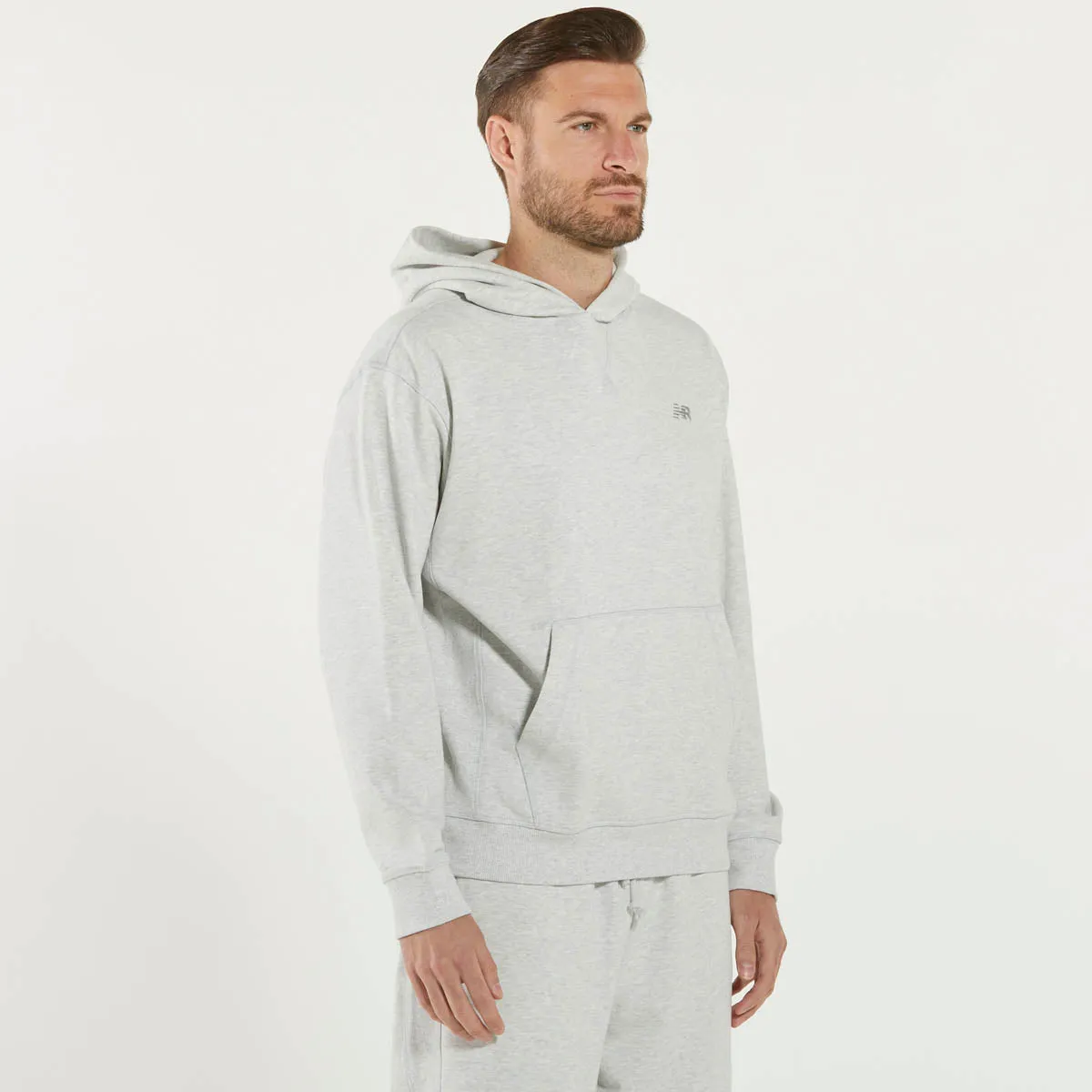 New Balance felpa con cappuccio grigia